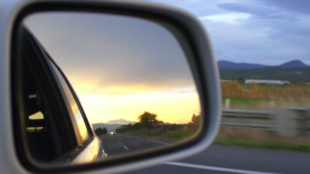 Sunset Through A Car Side Mirror.