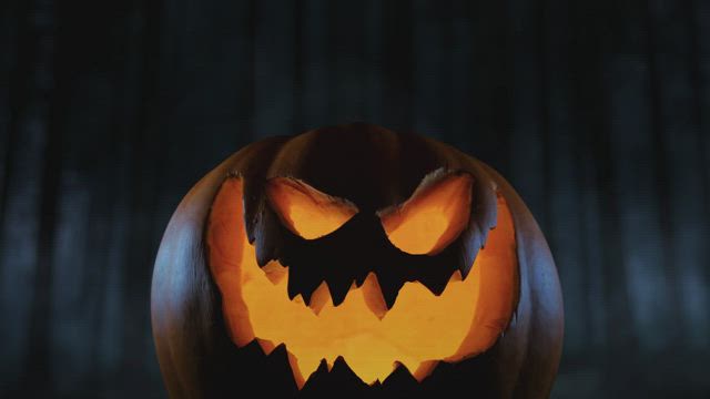 Creepy Halloween Pumpkin in Dark Cloud Forest.
