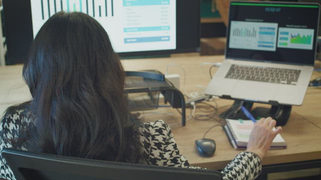 Professional woman working in an office.