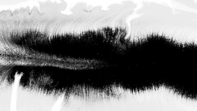 Black and white ink underwater.