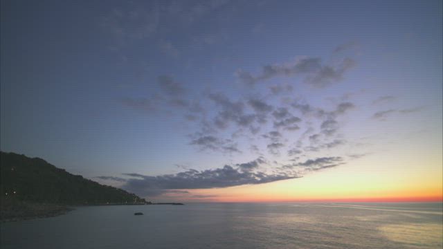 Day to night transition at the sea.