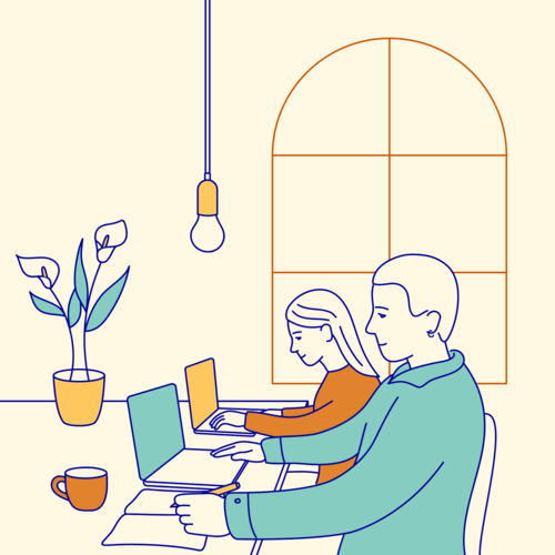 Team members working side by side on laptops